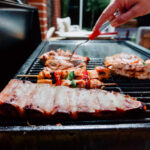 The Difference Between Grilling And Barbecuing!